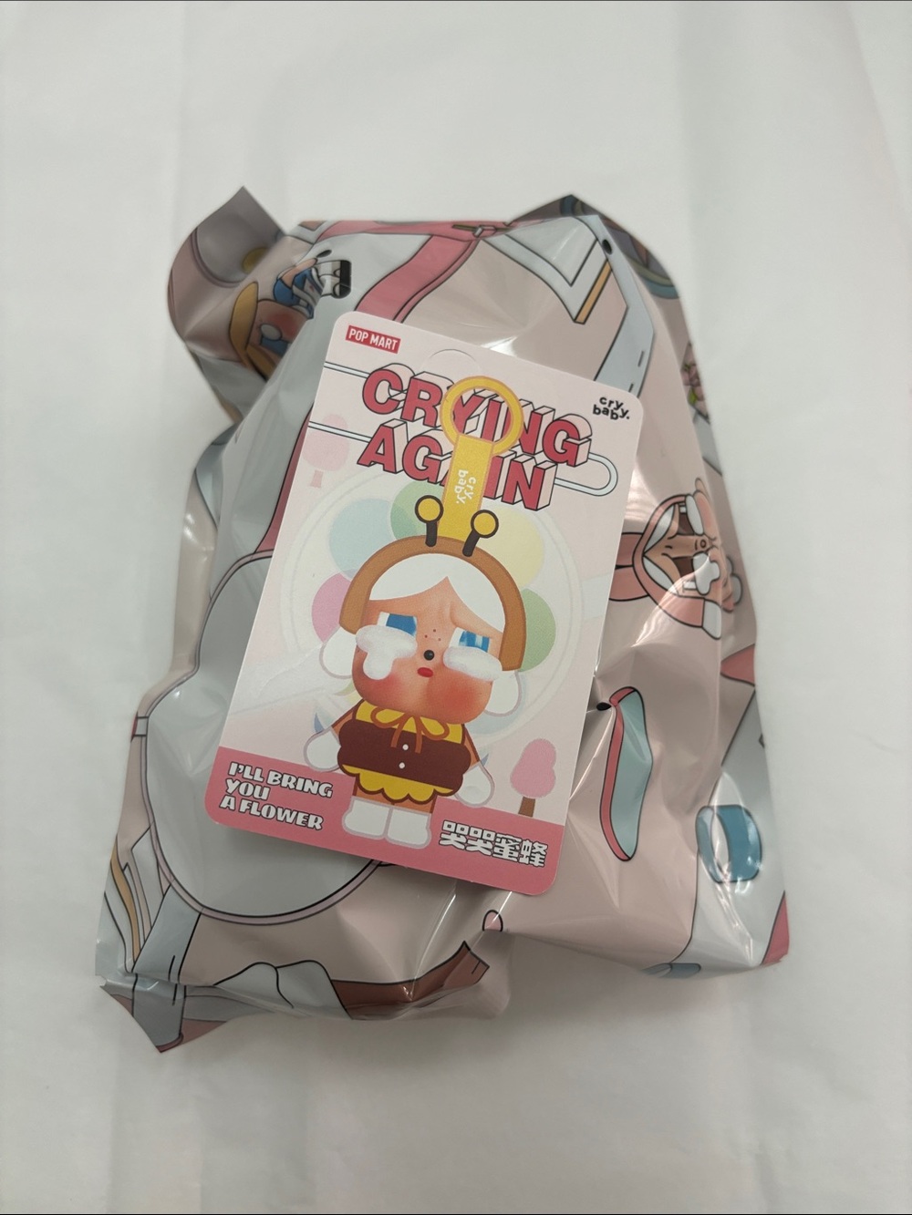 POP MART Crybaby Crying Again Plush Pendant - I’ll Bring You a Flower